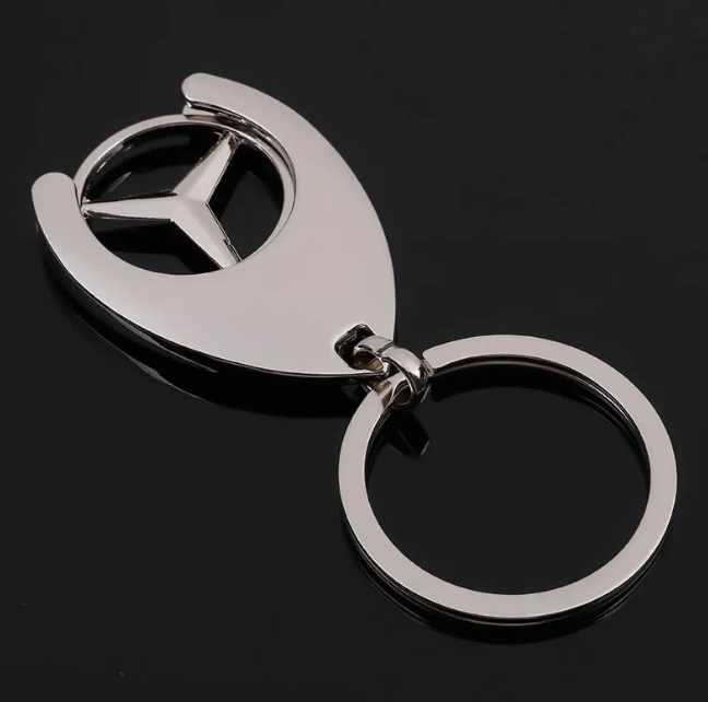 
                      Mercedes-Benz Winkelwagenmunt Sleutelhanger
                      - Foto
                      2
                    