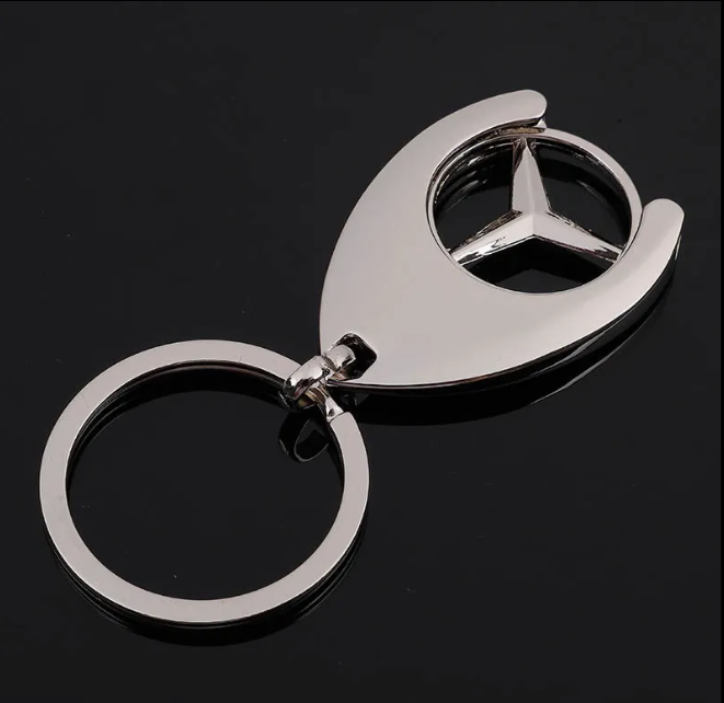 
                      Mercedes-Benz Winkelwagenmunt Sleutelhanger
                      - Foto
                      3
                    